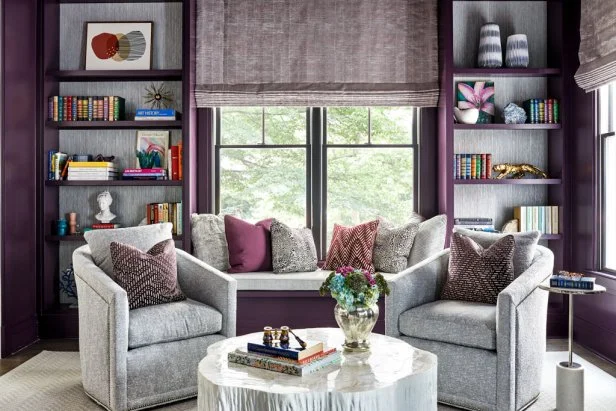 purple library with wallpaper and built-in bookcases