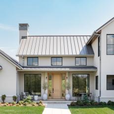 Modern Farmhouse Nestled Comfortably on a Golf Course