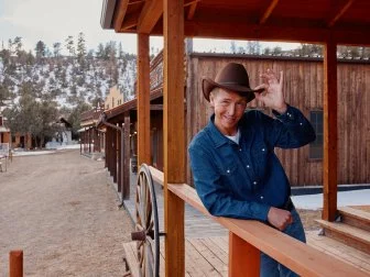 Host Jack McBrayer reacting to the exterior of the Wild West Town, as seen on Zillow Gone Wild, Season 2.