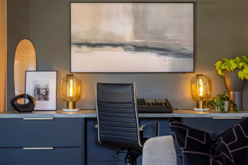 The Property Brothers created this handsome built-in desk where Ken can work on his YouTube drum videos.