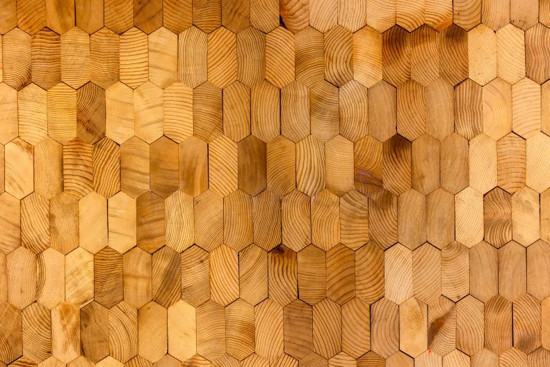 Wooden tiles help better soundproof the music room and lounge, and these graphic tiles do the job with even more style and are John's clear preference for the right vibe.