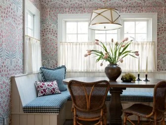 Red and Blue Breakfast Nook With Checked Pillows