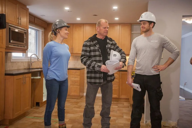 Sherry Holmes (L), Mike Holmes (C) and Mike Holmes Jr (R) as seen on Holmes:Next Generation discussing the plans for the kitchen renovation. ..As seen on Holmes: Next Generation..(talent action)