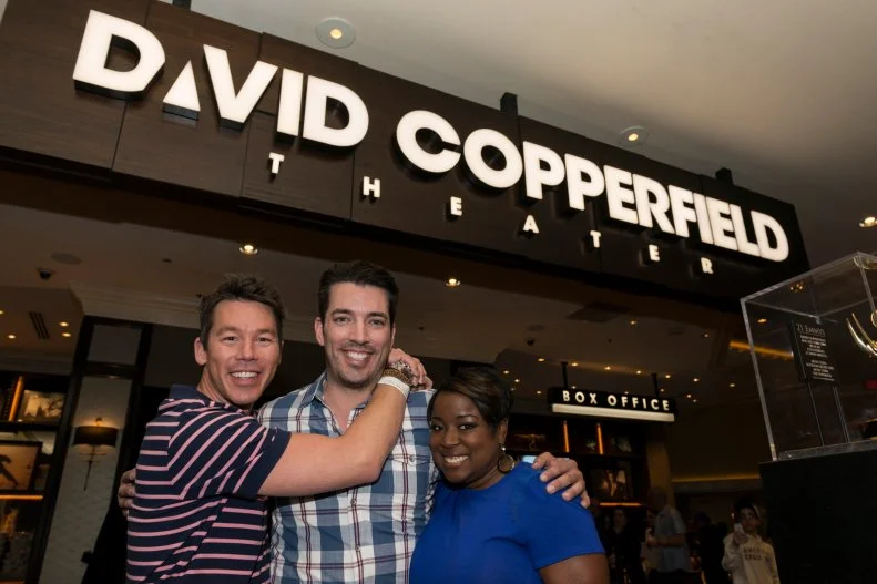 Guest judges Tiffany Brooks and David Bromstad with Jonathan Scott in front of David Copperfield's theater, as seen on Brother vs. Brother. (portrait)