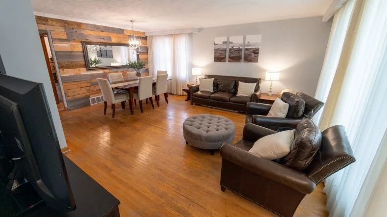 Mike and Janetta's living room is looking pretty beat up.  The dining area is small, and the space just isn't serving the family the way then need it to now that the family has grown.