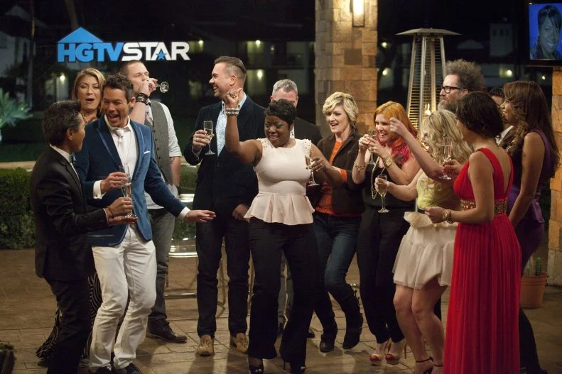 As seen on HGTV Star season 8, finalist Tiffany Brooks is congratulated by host David Bromstad, the panelists and the returning designers after being named the winner at the end of the final evaluation and elimination, at Rancho Las Palmas Resort and Spa in Rancho Mirage, California.