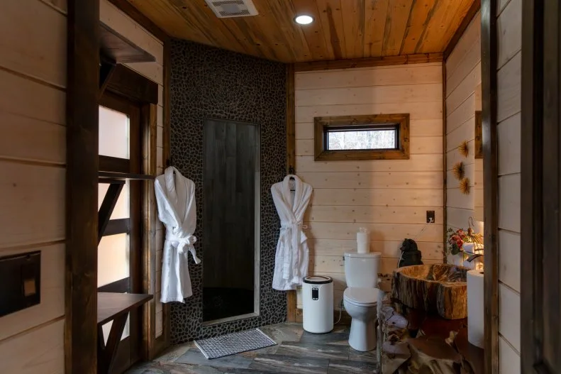 first-floor master bathroom at Treetopia Treehouse in Broken Bow