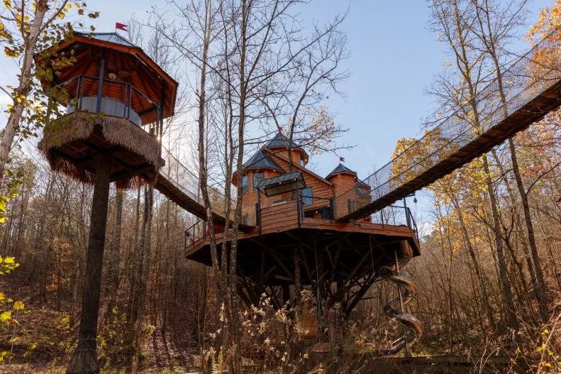 ground-level view of Treetopia Treehouse in Broken Bow