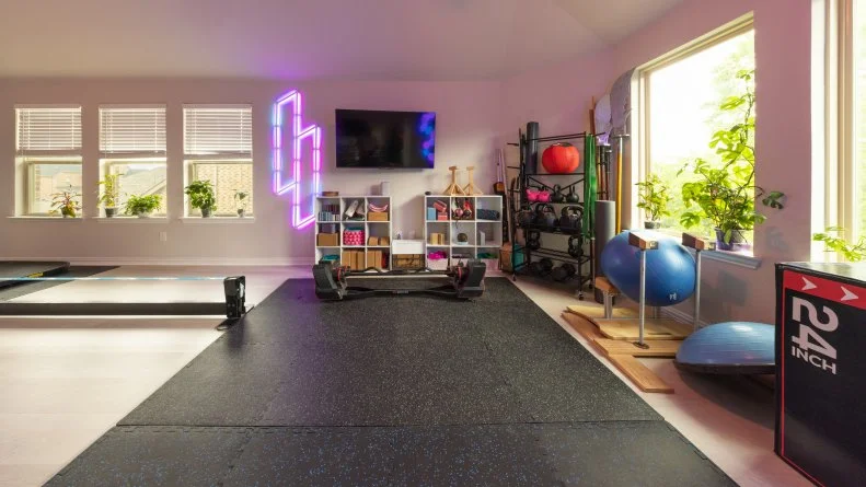Fitness room in client's Mark and Anastasia's home, as seen on Extreme Buyers Club Season 1