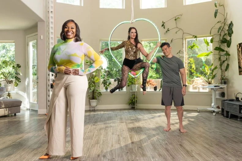 Host Noel Collier and client's Anastasia and Mark Portrait inside of the Allen home, as seen on Extreme Buyers Club Season 1
