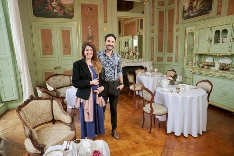 Ian Figueira and Daphne Reckert in reveal ready room, as seen on Castle Impossible, Season 2.
