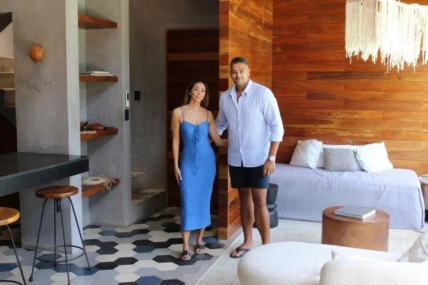 Contributors Akhil Patel and Amy Leong during their house tour, as seen on Tropic Like It's Hot, Season 1.