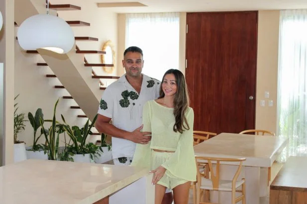 Contributors Akhil Patel and Amy Leong during their house tour, as seen on Tropic Like It's Hot, Season 1.