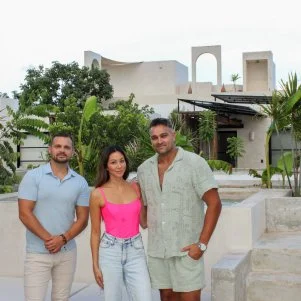 Agent Lev Makievsky and contributors Akhil Patel and Amy Leong during their house tour, as seen on Tropic Like It's Hot, Season 1.