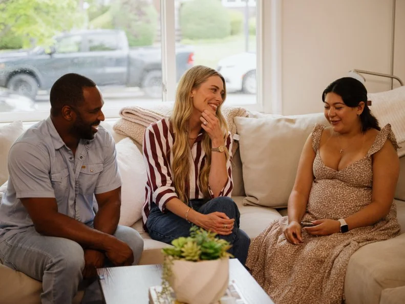Host, Arielle Vandenberg, and Steve Lewis, Contractor,  and homeowner Melissa Rivas as seen on House Shock, Season 1