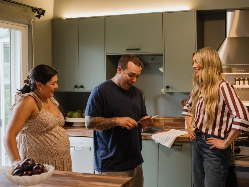 Host, Arielle Vandenberg and homeowners, Melissa and Russ Rivas- Marden, as seen on House Shock, Season 1