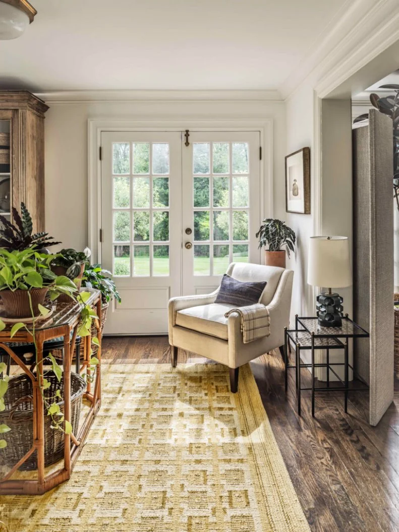 White Sitting Area With Yellow Rug