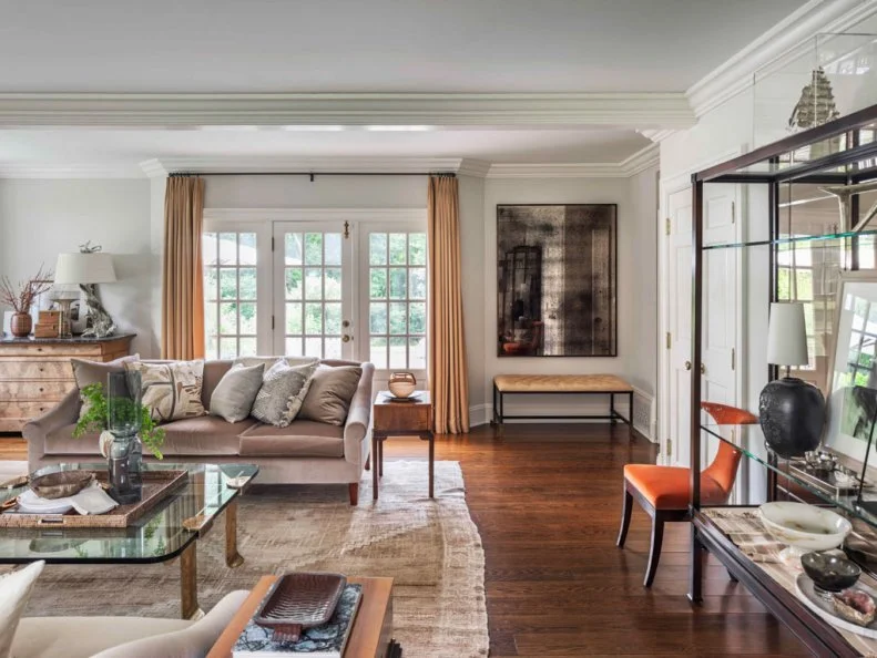 Neutral Living Room With Orange Chair