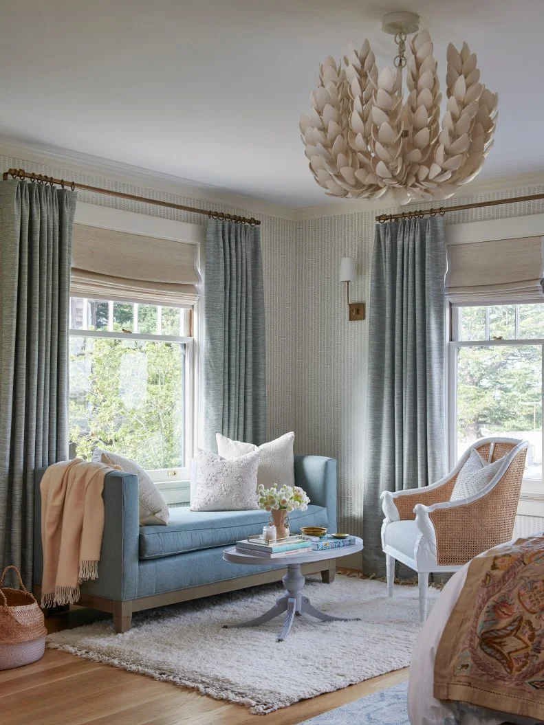 Neutral Bedroom With a Blue Daybed for Extra Seating