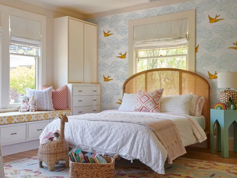Warm Beige Kid's Bedroom With Wallpaper and a Window Seat