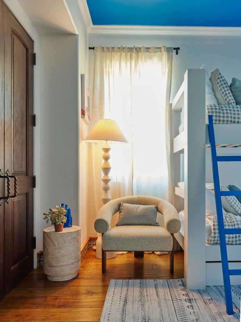 Beauty shot of the completed Santorini Bunk Bed room, as seen on Bachelor Mansion Takeover Season 1.