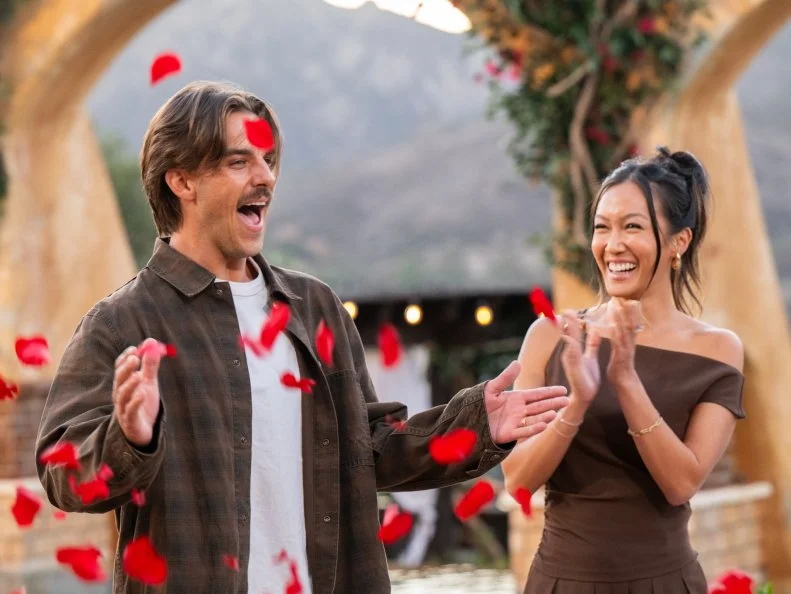 Contestants Noah Erb and Tammy Ly during winner reveal, tour the mansion, as seen on Bachelor Mansion Takeover, Season 1.