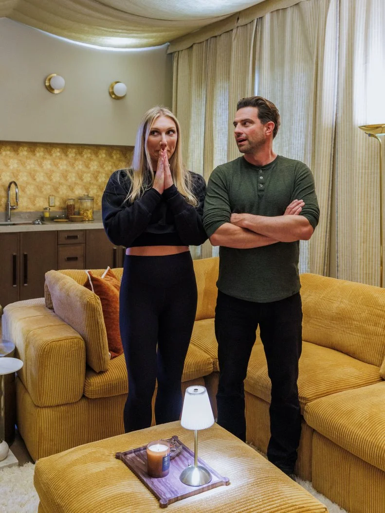 Team Scott McGillivray and Brooke Hogan have a negative reaction in Team Kim Wolfe and Chelsea Meissner's Multi-Gen Suite, portrait, as seen on Rock the Block, Season 7.