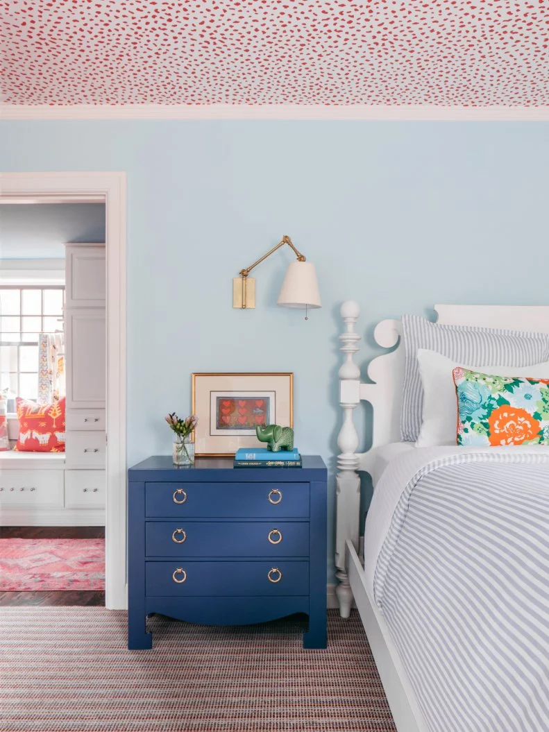 Blue Kid's Room With Wallpaper on the Ceiling