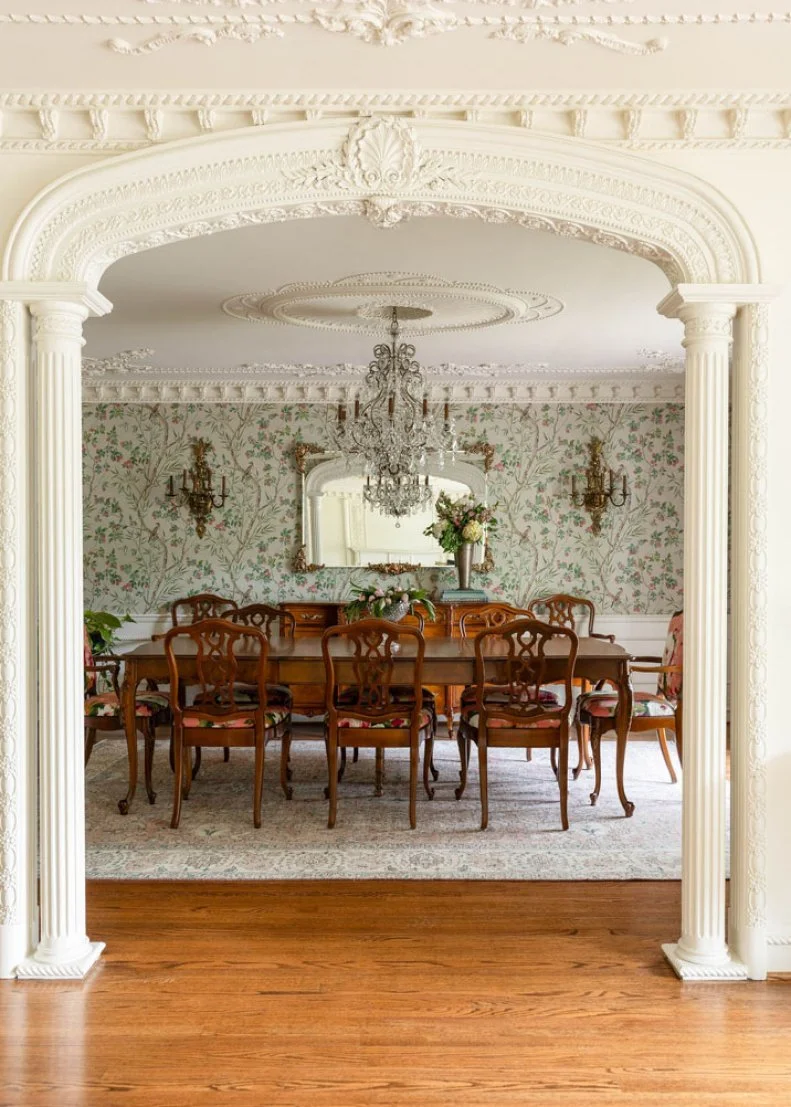 The old world molding in this home creates dramatic transitions between rooms as well as a sense of grandeur.