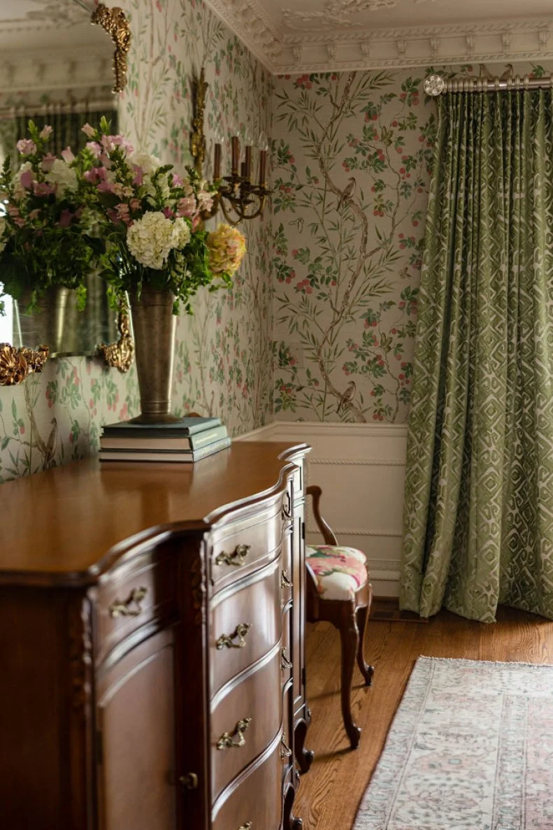 Lindsey was intent on making some of her grandmother's furniture work in this dining room. Keeping the use of accessories at a minimum helps keep the room from being too fussy or overwhelming.