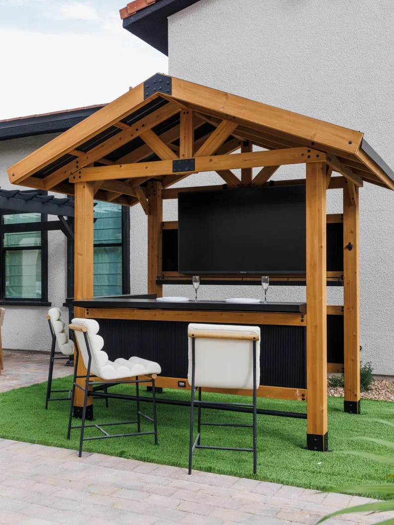 After of Team Scott McGillivray and Brooke Hogan's Backyard, as seen on Rock the Block, Season 7.