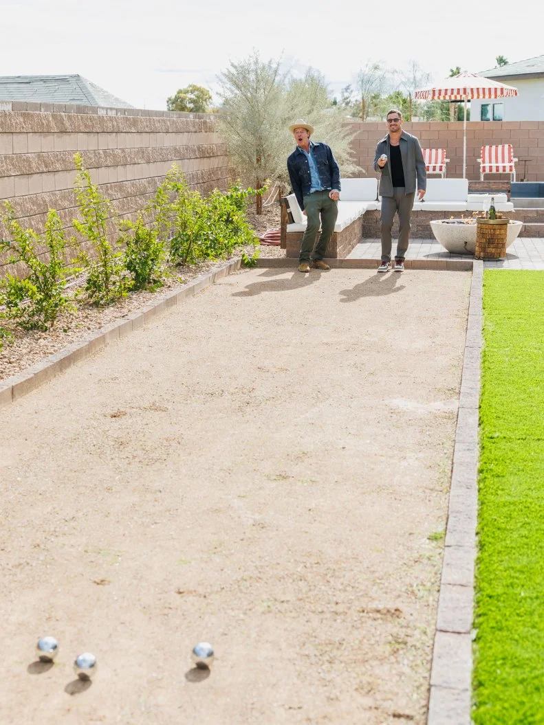 Host Ty Pennington and Danny Amendola review Team Kim Wolfe and Chelsea Meissner's Backyard, as seen on Rock the Block, Season 7.