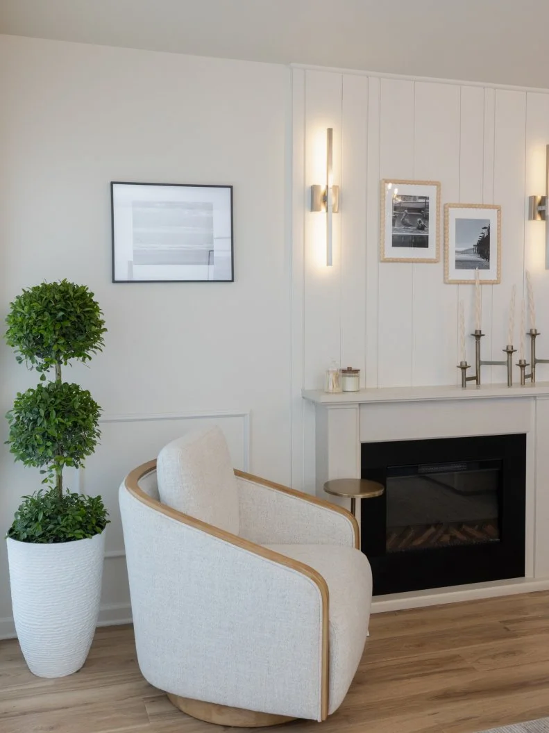 After of Team Sarah Baeumler’s living room that included adding a bedroom and new fireplace, as seen on Battle on the Beach, Season 5.