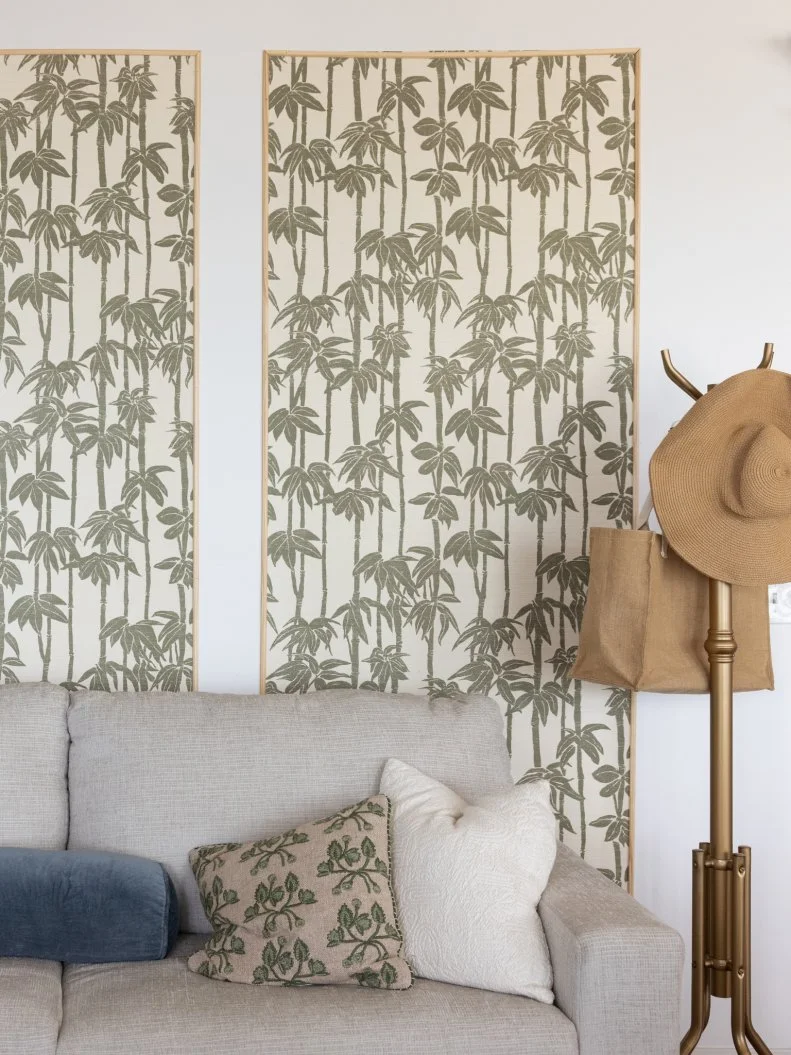 After of Team Mika Kleinschmidt’s living room renovation that included a new fireplace and wallpaper detailing, as seen on Battle on the Beach, Season 5.
