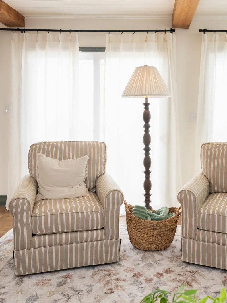 After of Team Mika Ty Pennington’s living room renovation that included adding a new fireplace and wood beams, as seen on Battle on the Beach, Season 5.