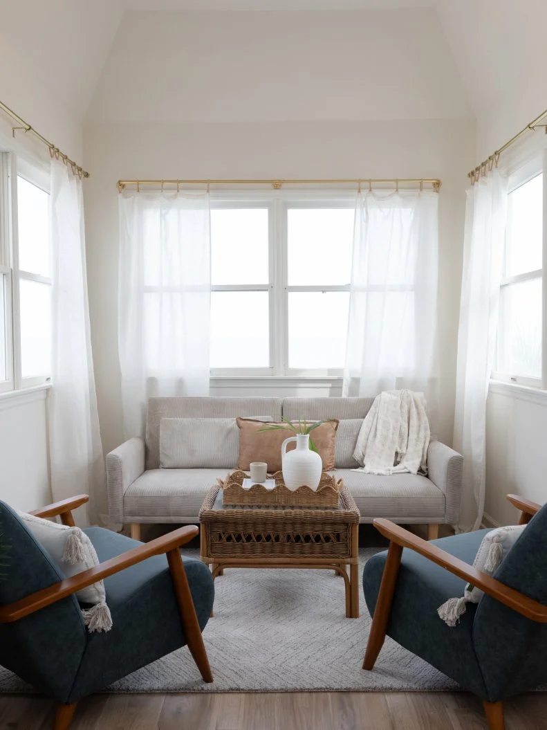 After of Team Sarah Baeumler’s main suite bedroom with a sitting area, as seen on Battle on the Beach, Season 5.