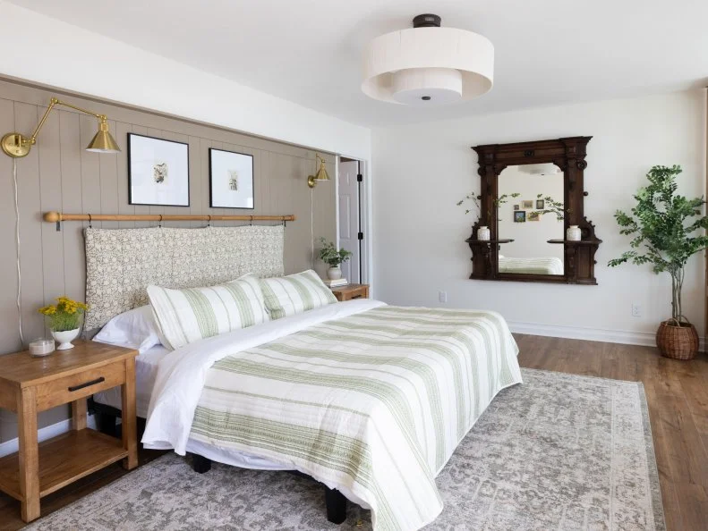 After of Team Ty Pennington’s main suite bedroom with a sitting area, as seen on Battle on the Beach, Season 5.