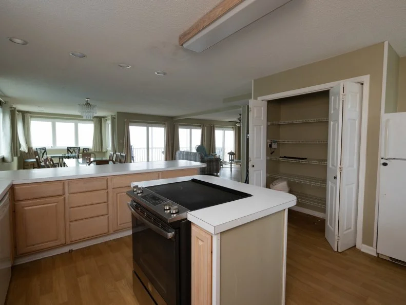 Before of Team Ty Pennington’s Kitchen and Dining Room, as seen on Battle on the Beach, Season 5.