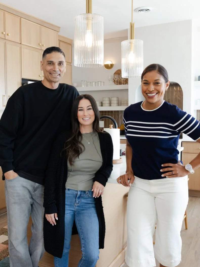Judges Tristyn and Kamohai Kalama pose with mentor Mika Kleinschmidt in her team’s kitchen renovation, as seen on Battle on the Beach, Season 5.