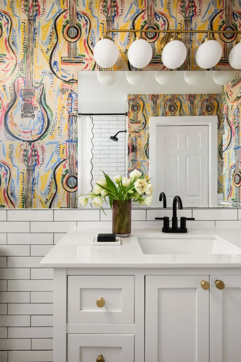 Jessica took every opportunity to lean into the music theme of this Texas ranch home including wallpaper seen throughout the home that double down on the musical message.