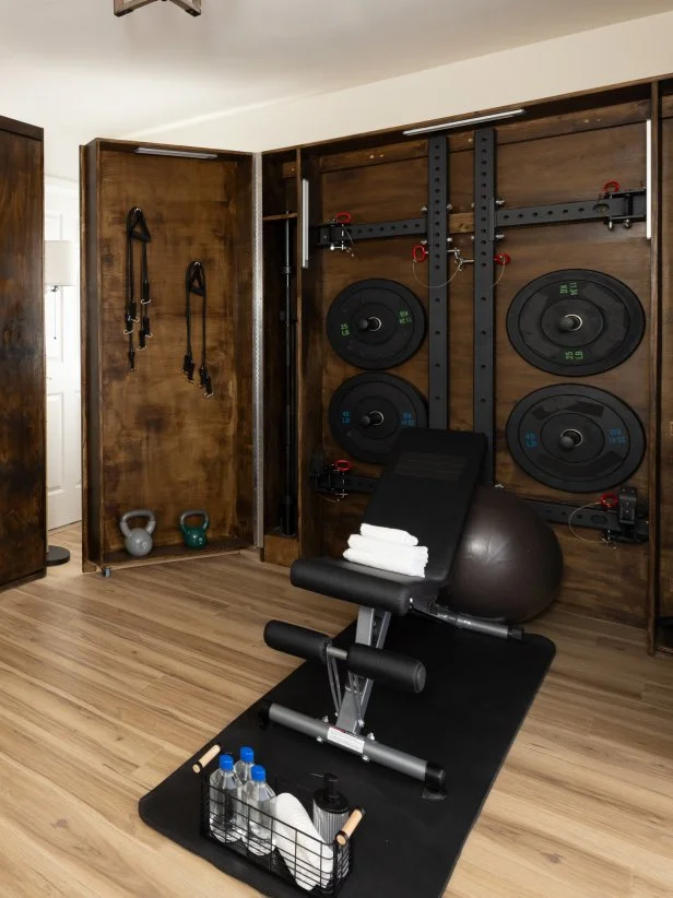 After of Team Sarah Baeumler’s guest bedroom with a Murphy gym and Murphy bed, as seen on Battle on the Beach, Season 5.