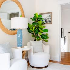White Transitional Sitting Area With Blue Lamp