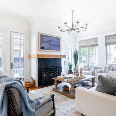 Neutral Transitional Living Room With Black Fireplace