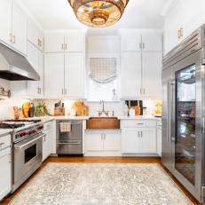 White Transitional Chef Kitchen With Copper Pots