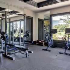 Gray Home Gym With Bench Press Bar