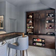 Gray Media Room With Quilted Stools