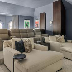 Gray Contemporary Home Theater With White Chaises