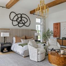 Neutral Contemporary Bedroom With Round Coffee Table