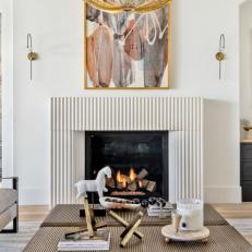 White Contemporary Living Room With Ribbed Fireplace