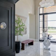 Gray Arched Doorway and White Foyer